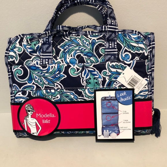 Modella by Conair Handbags - Conair travel cosmetic clutch.